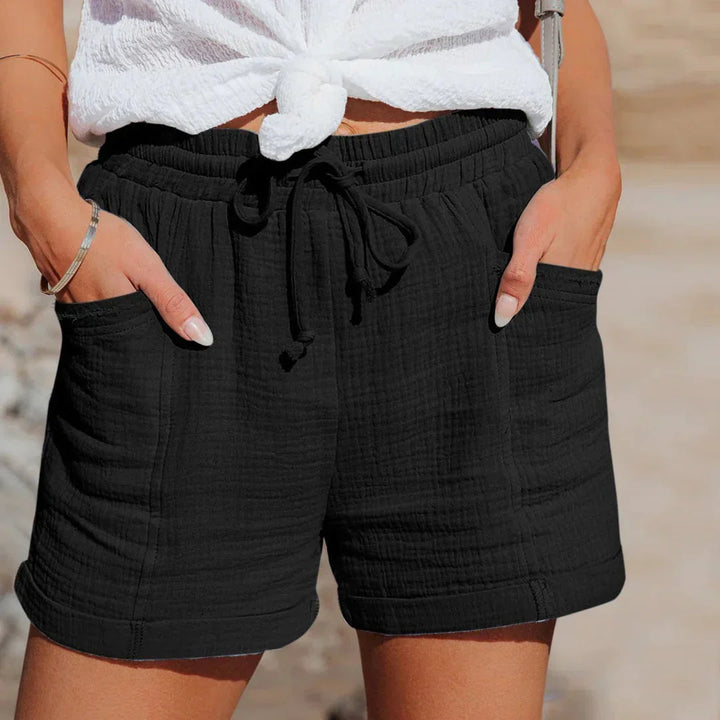 "Luchtige dames zomershorts met elastische taille, lichtgewicht en comfortabel, perfect voor warme zomerdagen."