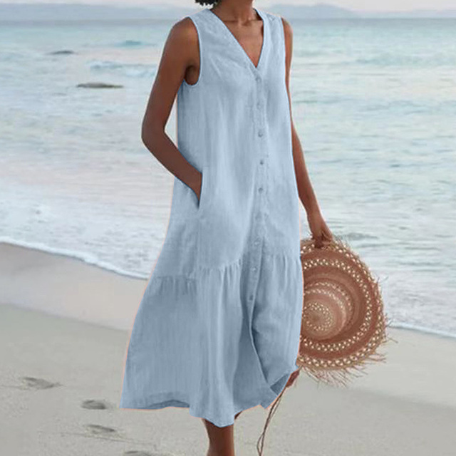 "Luchtige, stijlvolle zomerjurk met flatterende pasvorm en levendige prints voor vrouwen, perfect voor warme dagen."