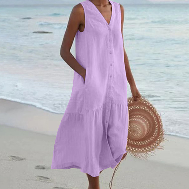 "Luchtige, stijlvolle zomerjurk met flatterende pasvorm en levendige prints voor vrouwen, perfect voor warme dagen."