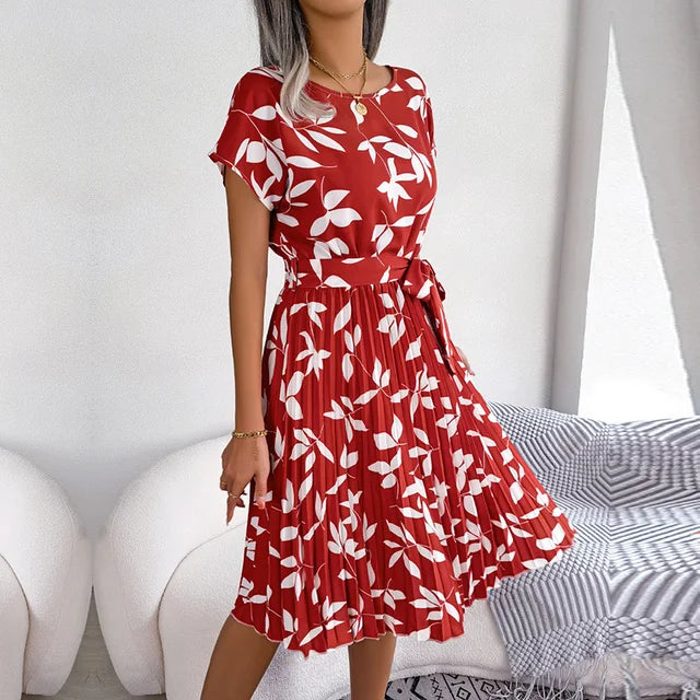 "Luchtige zomerjurk dames, elegante pasvorm, levendige kleuren, veelzijdig voor zomerse gelegenheden, vrouwelijk ontwerp."