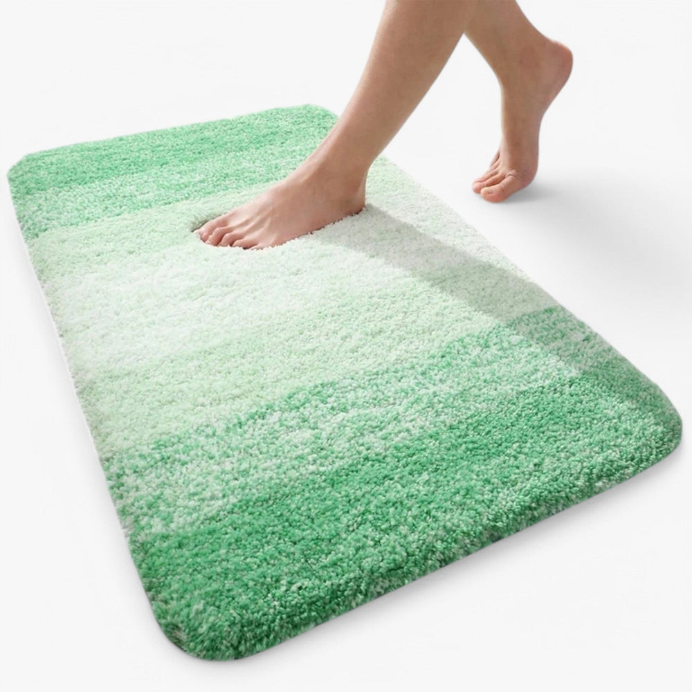 Veilige antislip badmat in de badkamer, voorkomt uitglijden; zacht microvezel biedt comfort en snelle droging.