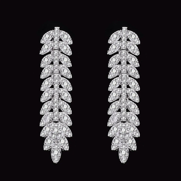 Exclusieve bruidssieraden: zirkonia halsketting en oorbellen set. Voegt glans toe aan elke bruidslook.