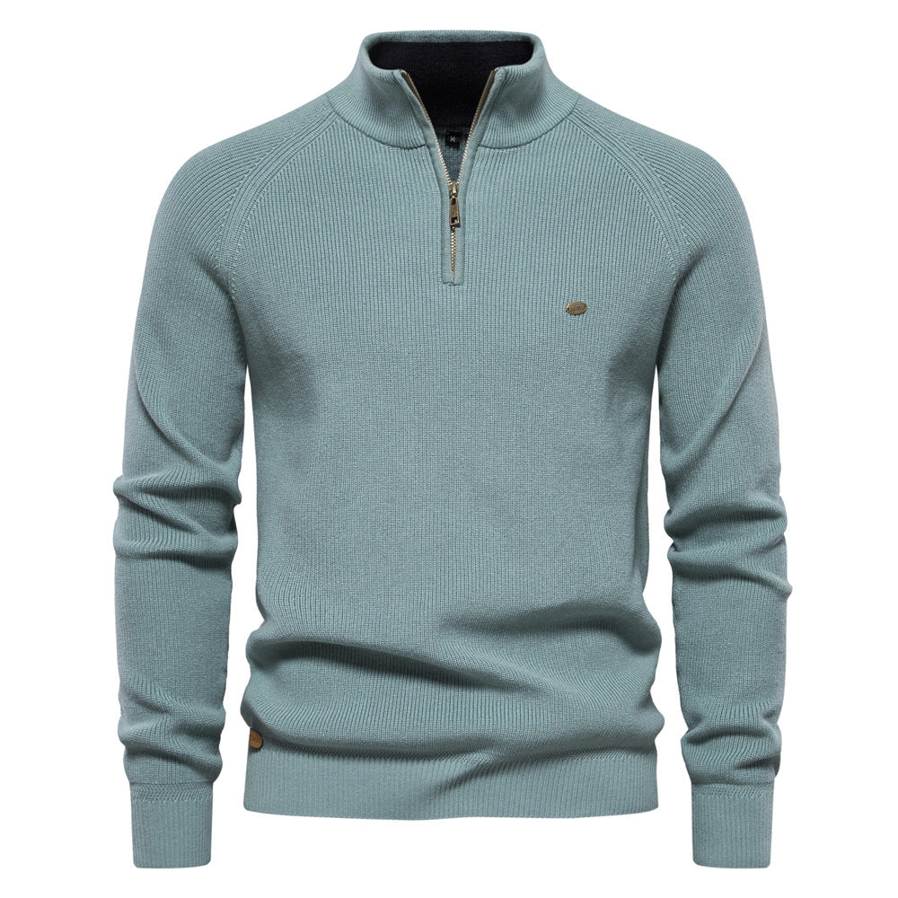 Grijze luxe halfzip herentrui, gemaakt van zacht, hoogwaardig materiaal voor optimaal comfort en stijl.