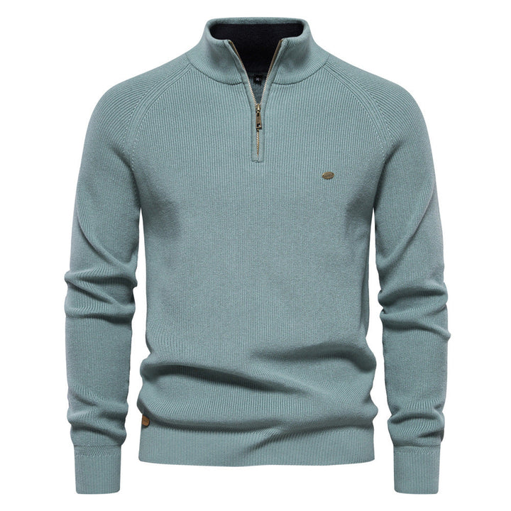 Grijze luxe halfzip herentrui, gemaakt van zacht, hoogwaardig materiaal voor optimaal comfort en stijl.