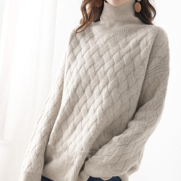 Luxe kasjmiertrui voor dames, crème kleur, zachte textuur, elegante en tijdloze stijl, geschikt voor elke gelegenheid.