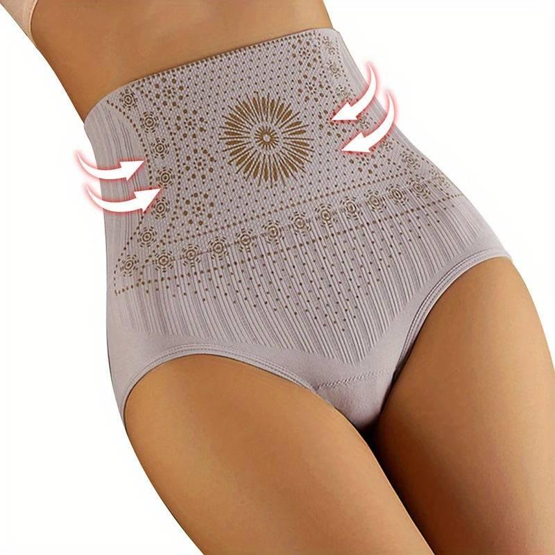 "Luxe shapewear, goud detail, slanke taille, platte buik, comfortabel, ademend, onzichtbaar onder kleding, elegant design."