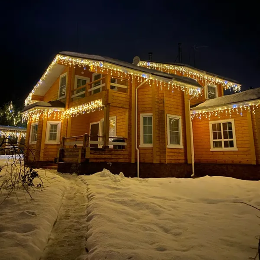 Magische kerst LED gordijnverlichting voor buiten, transparante draad, warm wit, 32m lang voor sfeervolle tuin.