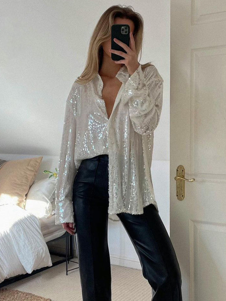 Dames oversized blouse met glitters; comfortabel, stijlvol en trendy. Perfect voor elke gelegenheid.