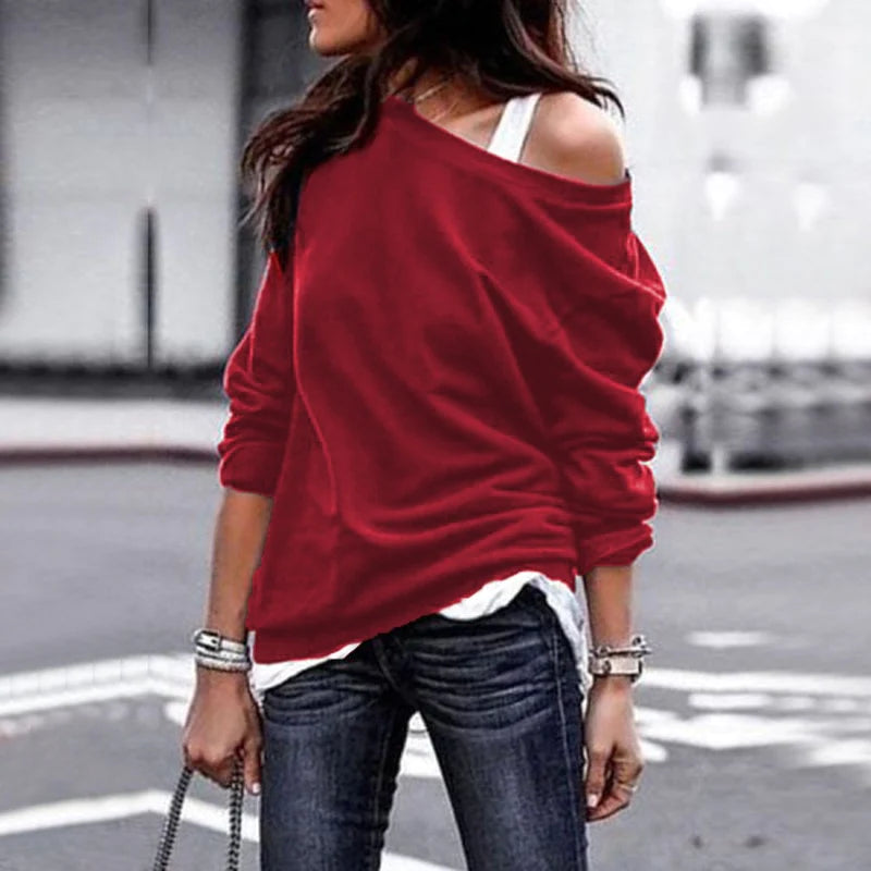 Stijlvolle asymmetrische damestrui met lange mouw, perfect voor een casual maar modieuze look.