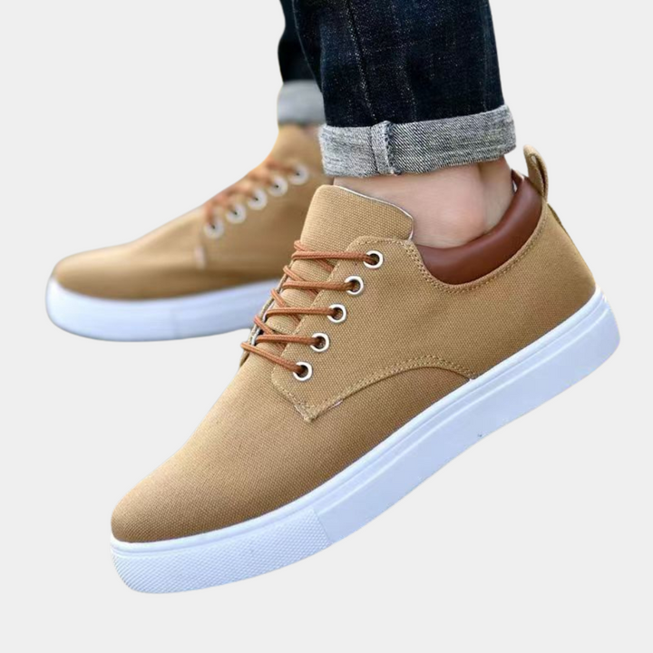Orthopedische heren sneakers in khaki, zijkant weergave, robuust design, ideaal voor comfort en stijlbewuste mannen.