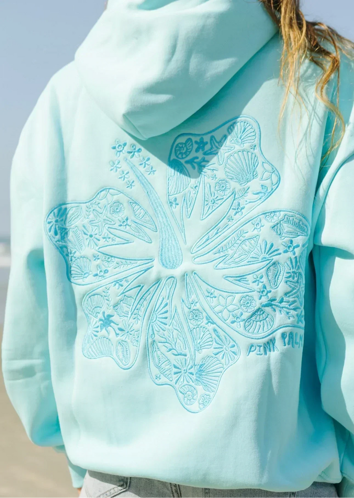 "Oversized tropische print hoodie voor dames, voorkant, comfortabele streetwear met zomerse uitstraling."