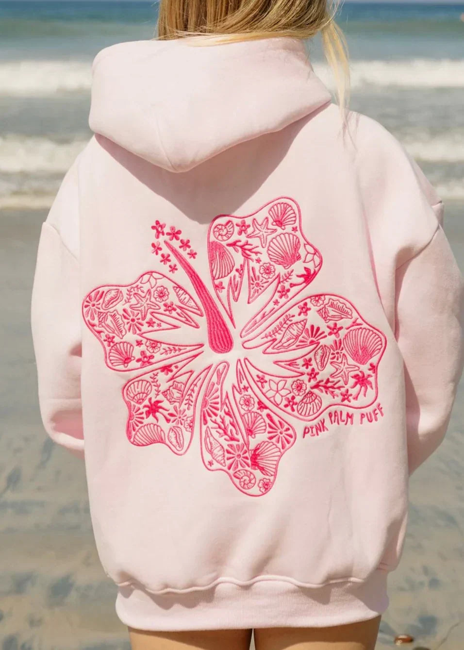 "Oversized tropische print hoodie voor dames, voorkant, comfortabele streetwear met zomerse uitstraling."