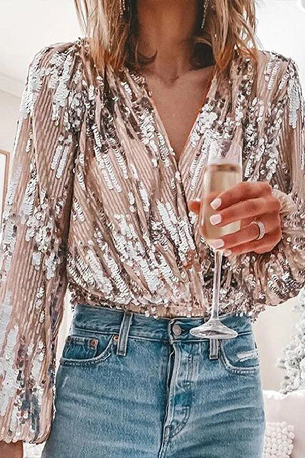 "Pailletten glamour blouse voor dames met V-hals en ballonmouwen, perfect voor feestelijke gelegenheden en elegante outfits."