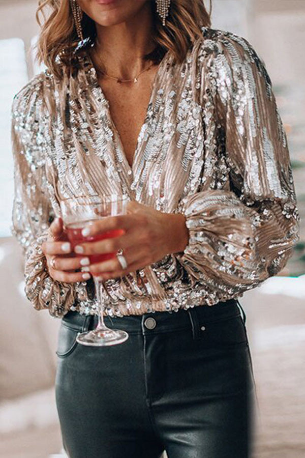 "Pailletten glamour blouse voor dames met V-hals en ballonmouwen, perfect voor feestelijke gelegenheden en elegante outfits."