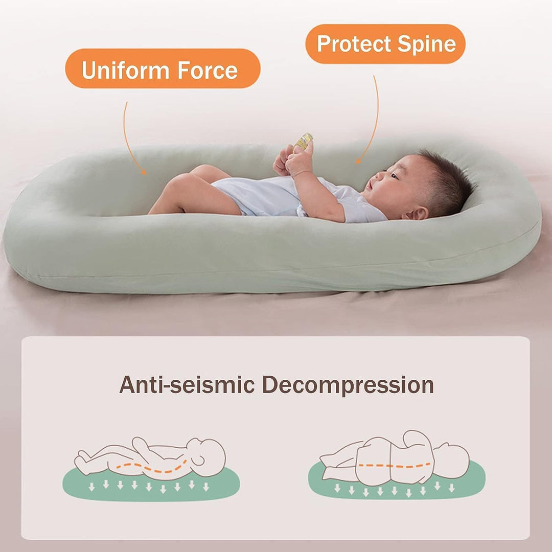 "Pastel baby lounger kussen van zacht katoen, veilige nest voor baby's 0-24 maanden, ademend en ergonomisch ontwerp."