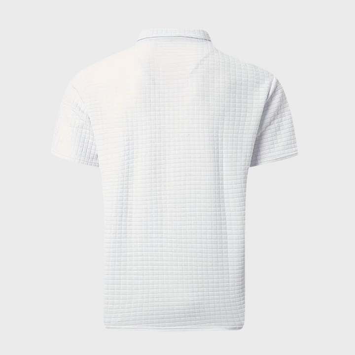 Stofdetails van het zachte en ademende poloshirt voor heren