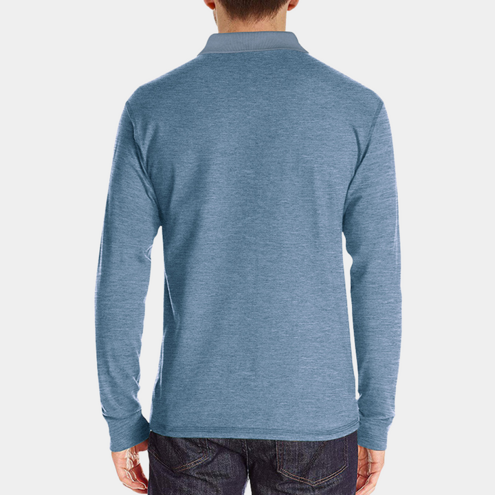 Poloshirt heren in blauw, elegante pasvorm, hoogwaardige stoffen, biedt comfort en stijl. Geschikt voor formele gelegenheden.