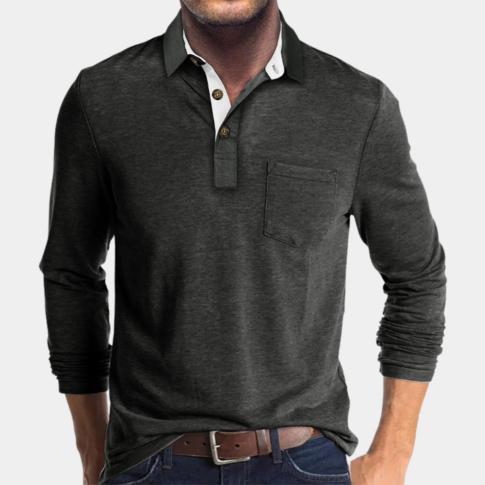 Poloshirt heren in blauw, elegante pasvorm, hoogwaardige stoffen, biedt comfort en stijl. Geschikt voor formele gelegenheden.