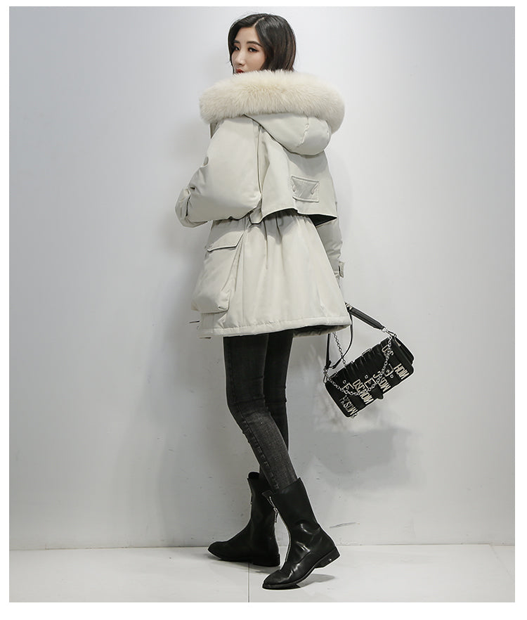 Elegante korte dames thermojas, perfect voor winterse mode en buitenkleding.