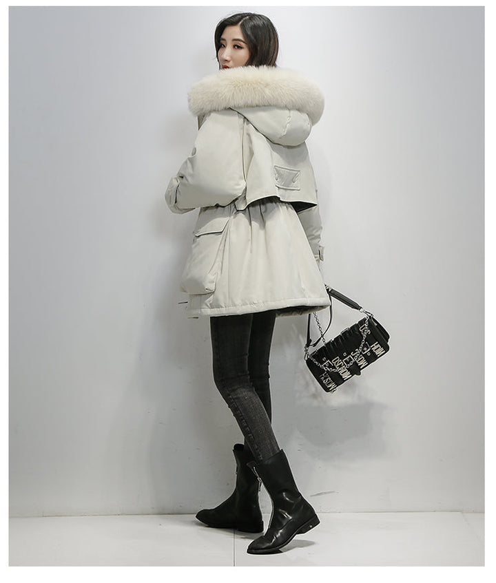 Elegante korte dames thermojas, perfect voor winterse mode en buitenkleding.