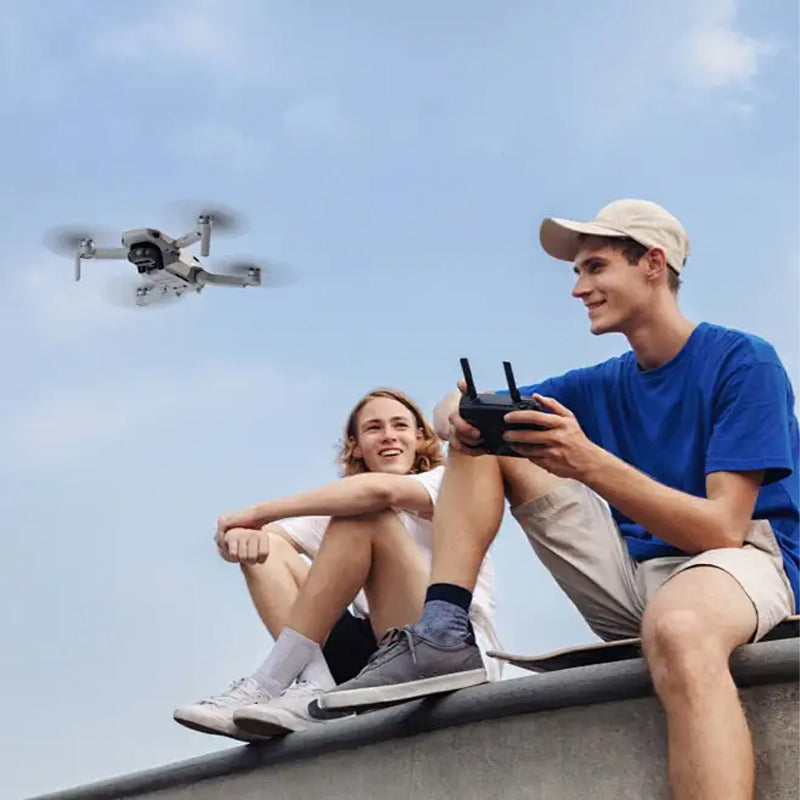 "Professionele drone met dual HD-camera's, opvouwbaar ontwerp, 5G GPS, obstakelvermijding en krachtige motoren."