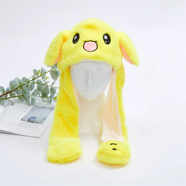 Grappige unisex muts met interactieve pluche oren in actie