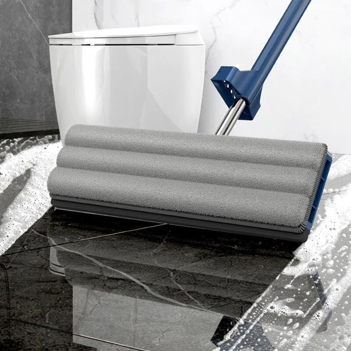 "Revolutionaire mop met 360° rotatie, geïntegreerde schraper en RVS steel voor efficiënte schoonmaak van houten en tegelvloer