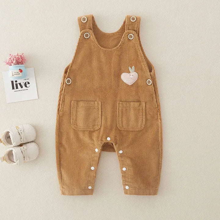 "Rib tuinbroek voor peuters, comfortabel en stijlvol, gemaakt van ribstof met duurzame katoen, trendy babykleding."