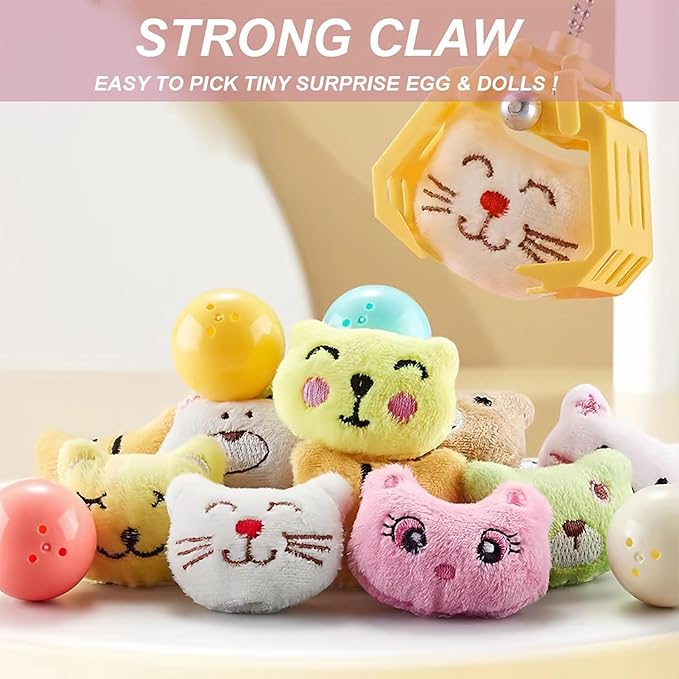 "Roze Mini Claw Machine speelgoed met licht- en geluidseffecten voor kinderen, ontwikkelt fijne motorische vaardigheden."