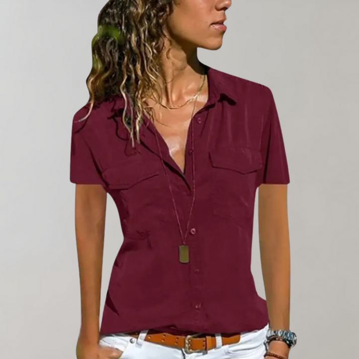 "Roze zomerse damesblouse met korte mouwen, elegante pasvorm, luchtig en veelzijdig voor warme dagen."