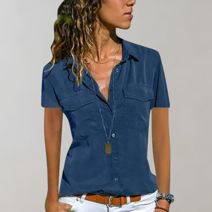 "Roze zomerse damesblouse met korte mouwen, elegante pasvorm, luchtig en veelzijdig voor warme dagen."