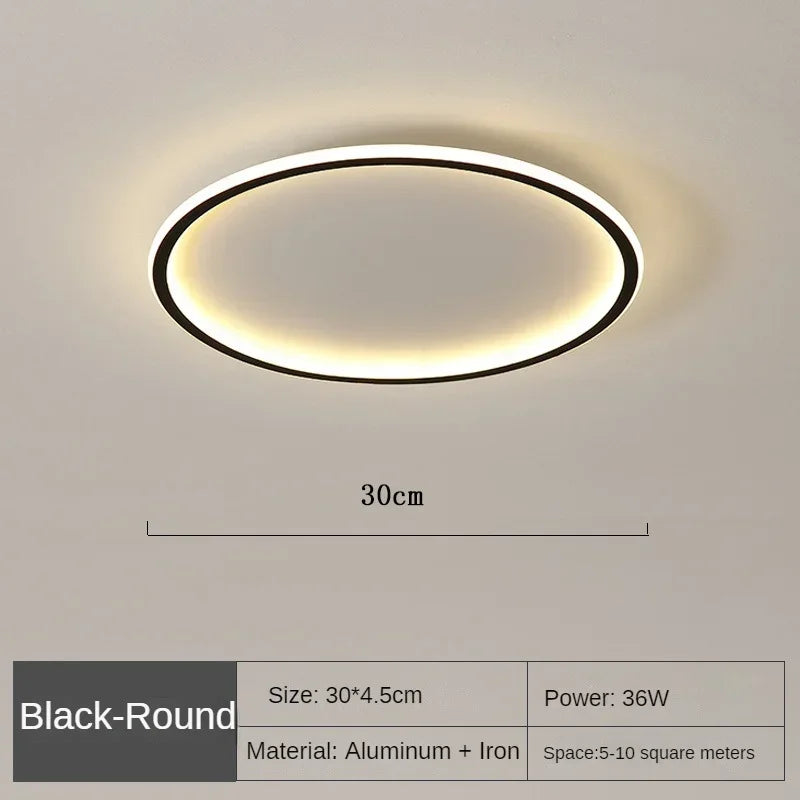 "Scandinavische ronde LED plafondlamp met minimalistisch ontwerp, metalen behuizing, glazen kap, past in modern interieur."