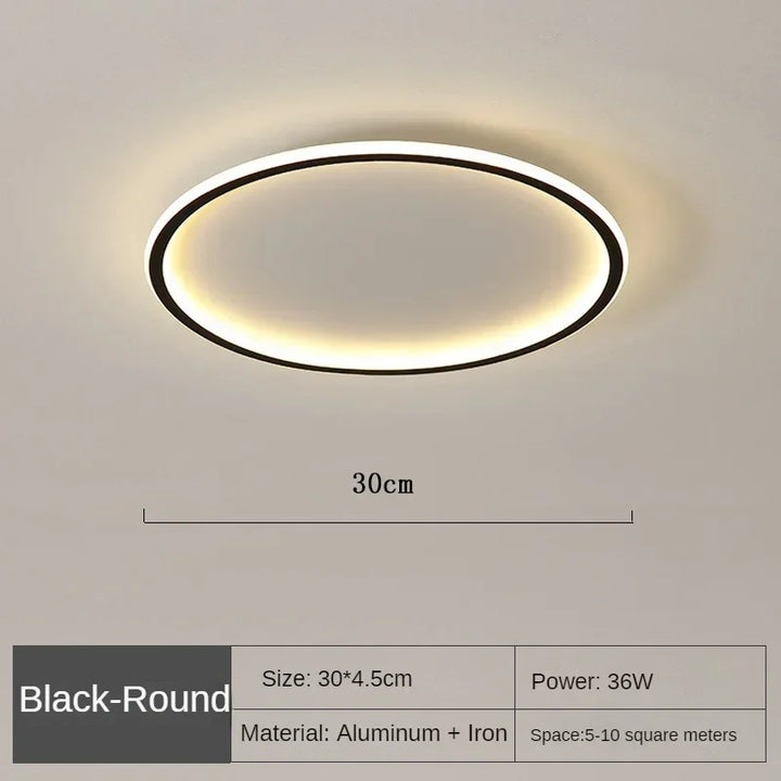 "Scandinavische ronde LED plafondlamp met minimalistisch ontwerp, metalen behuizing, glazen kap, past in modern interieur."