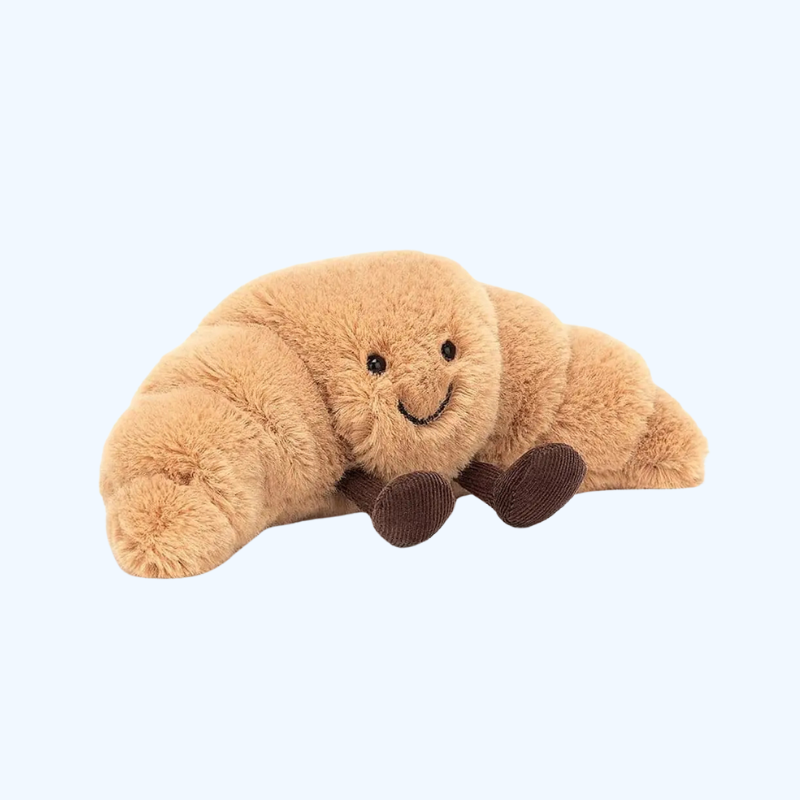 Schattige pluchen croissant knuffel met lachend gezicht, kort pluche en PP-katoen, perfecte decoratie of cadeau.