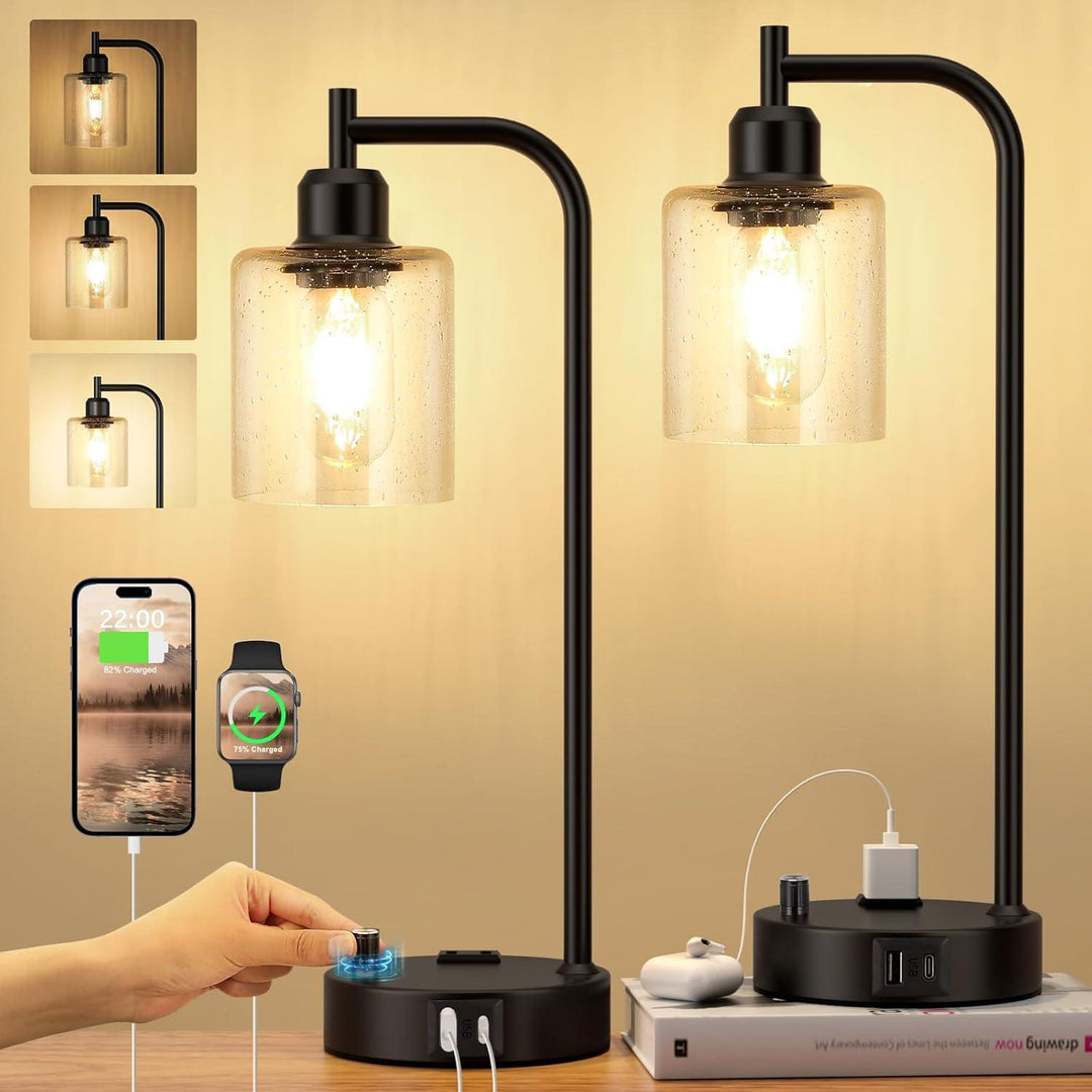 "Set van 2 dimbare industriële tafellampen met USB-poorten, mat zwarte basis en heldere glazen kap, modern ontwerp"