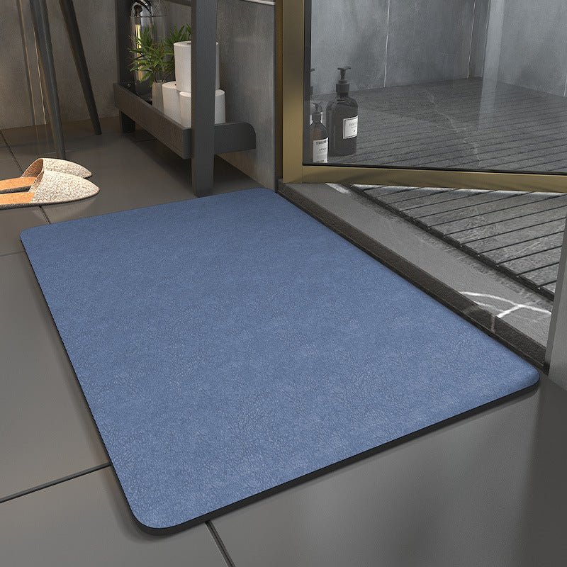 Snel drogende antislip badmat in lichtgrijs, absorberend textiel met zachte textuur voor veilige en hygiënische badkamer.