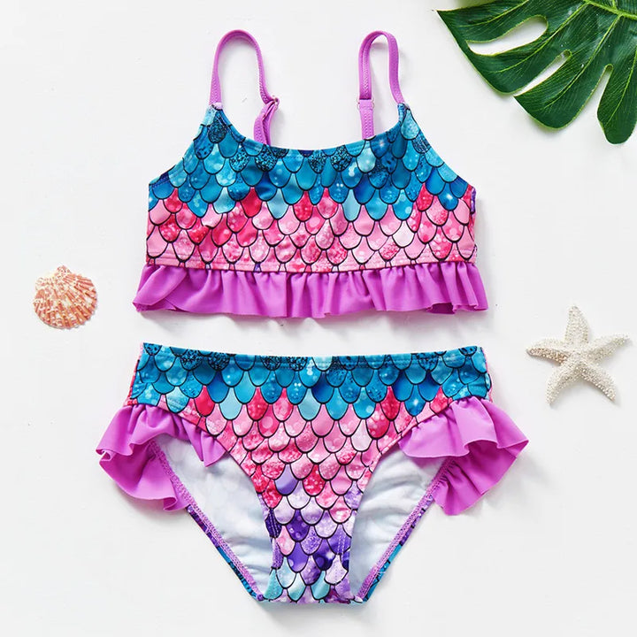 Sneldrogend kinderbikini set met kleurrijk design, ideaal voor strand of zwembad. Comfortabel, beschermend en speels.