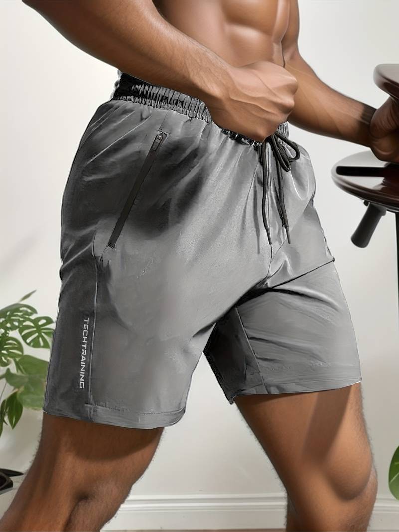 "Sneldrogende actieve herenshorts, lichtgewicht en ademend, wijnrood met flexibele pasvorm voor zomerse sportactiviteiten."