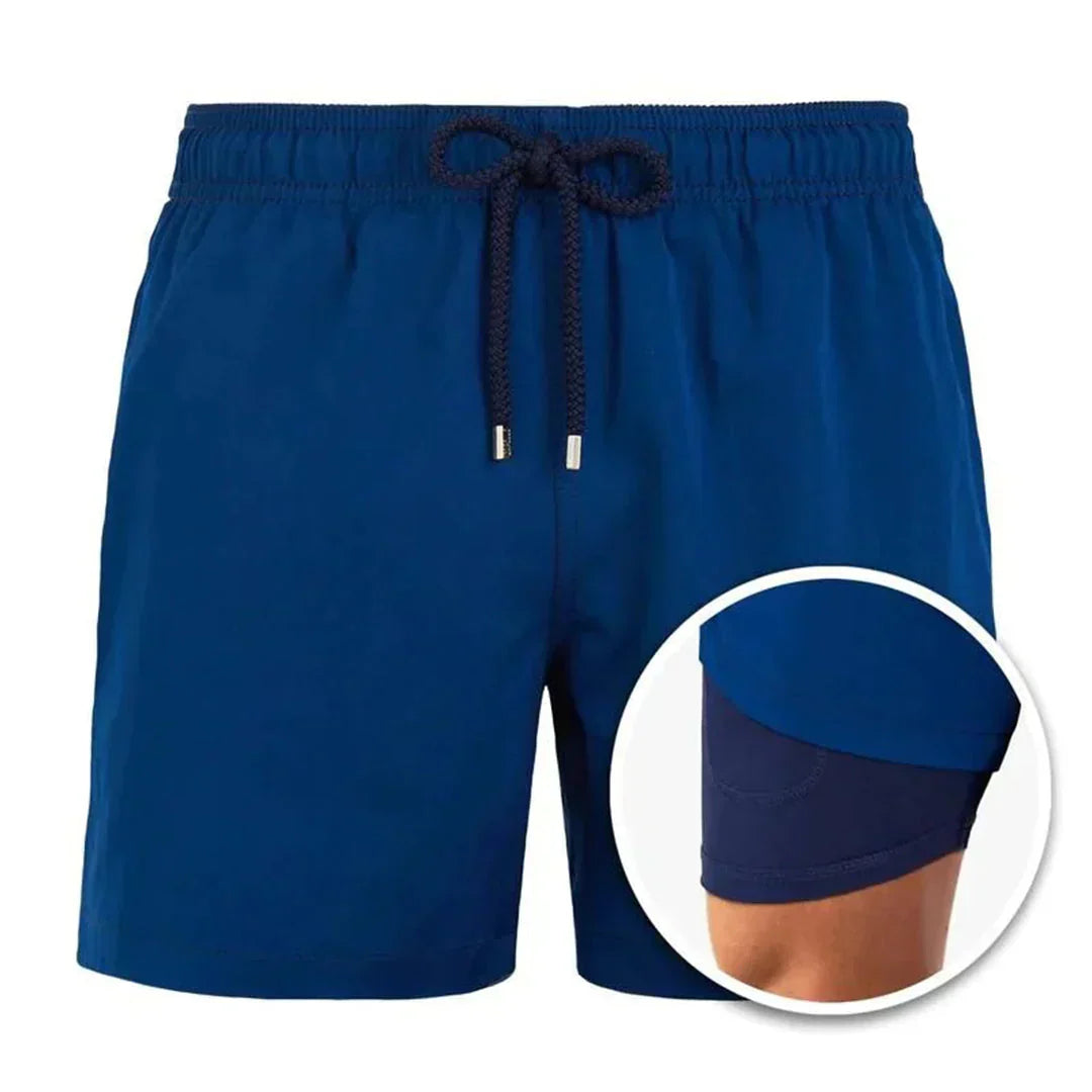 "Sneldrogende heren zwembroek met moderne pasvorm, blauw met elastische taille en trekkoord, stijlvol en comfortabel."