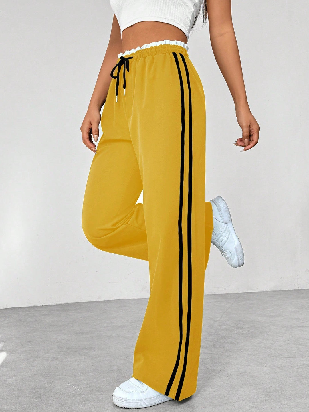 "Sportieve dames wide-leg broek, comfortabele pasvorm, elastische taille, trendy strepen, wijde pijpen, casual stijl"