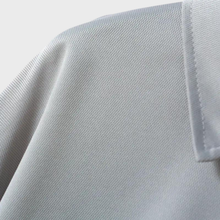 Stijlvol heren poloshirt met lange mouwen in marineblauw, zilvergrijs en zwart voor comfort en veelzijdige uitstraling.