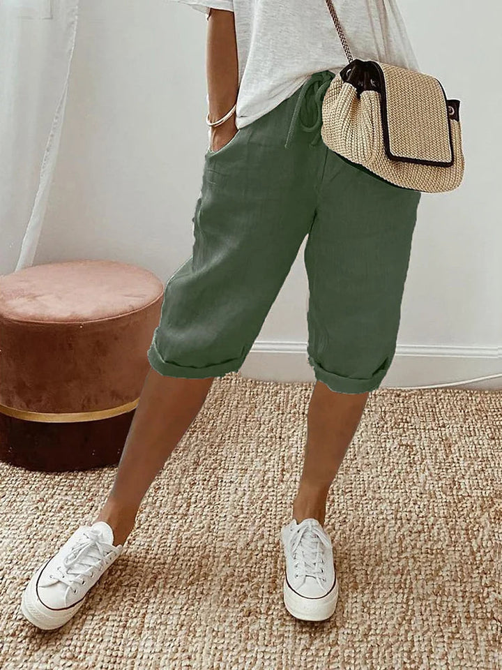 Stijlvolle en comfortabele dames shorts van katoenlinnen met elastische taille, trekkoorden en zijzakken, perfect voor zomer.