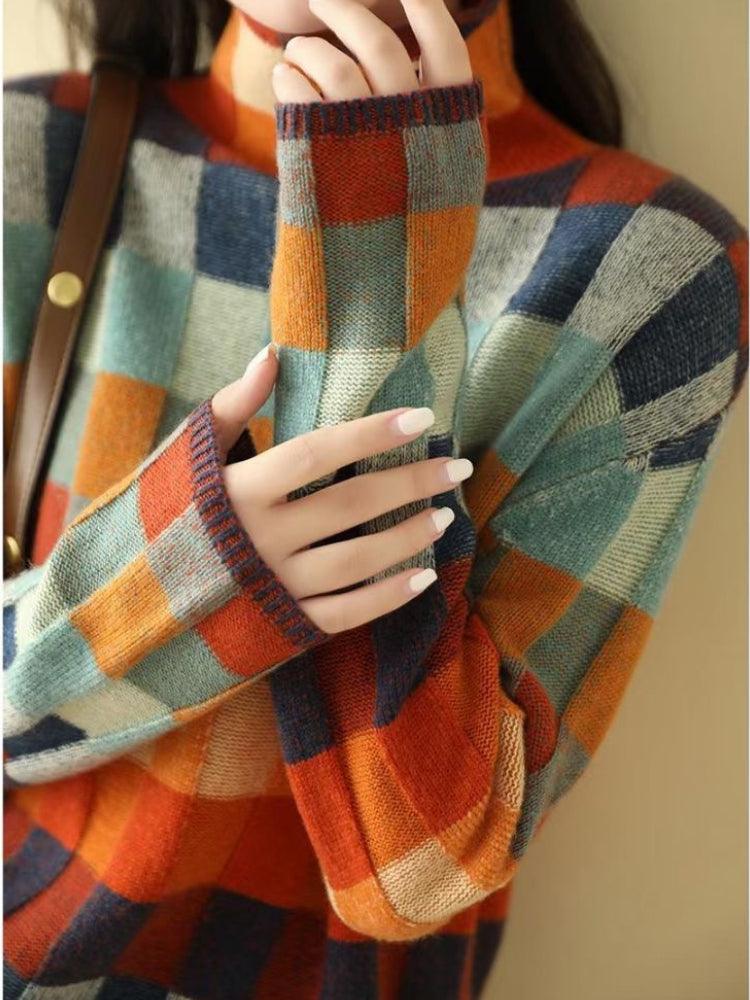 Stijlvolle kasjmier trui met veelkleurig blokpatroon, lange mouwen en zacht materiaal voor dames; trendy en veelzijdig.