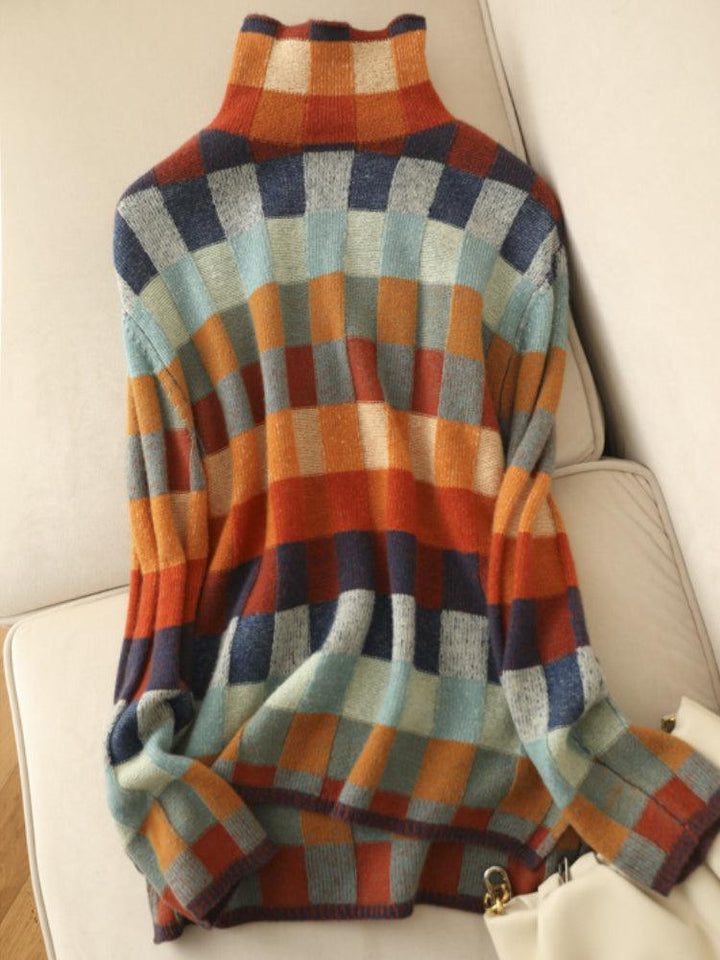 Stijlvolle kasjmier trui met veelkleurig blokpatroon, lange mouwen en zacht materiaal voor dames; trendy en veelzijdig.
