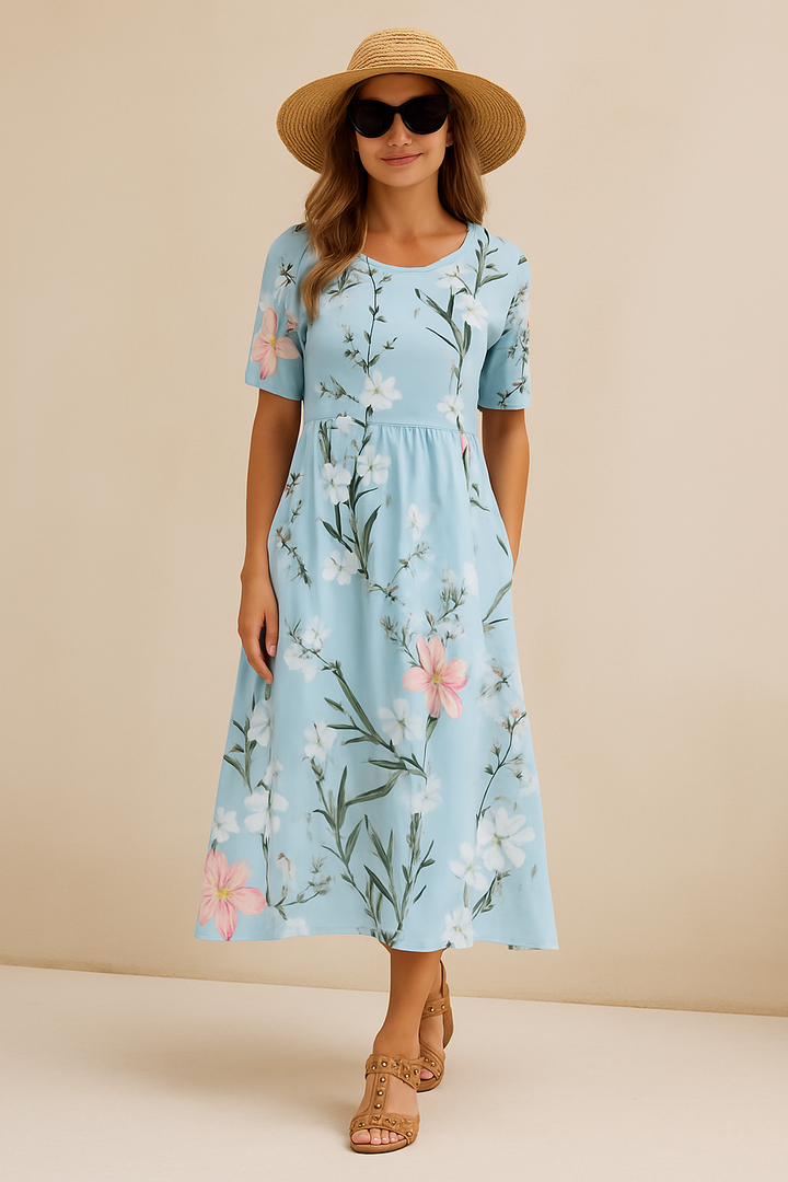 "Stijlvolle midi-jurk dames met charmant bloemenmotief en luchtige stof voor comfort en elegantie"