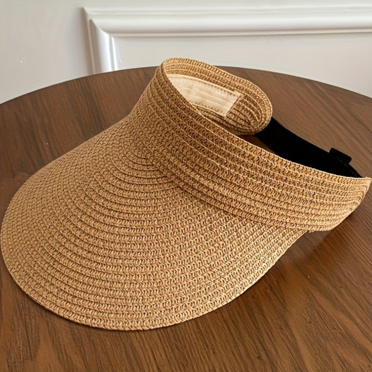 "Stijlvolle opvouwbare zonneklep met brede rand voor vrouwen, optimale bescherming tegen de zon, lichtgewicht en elegant."