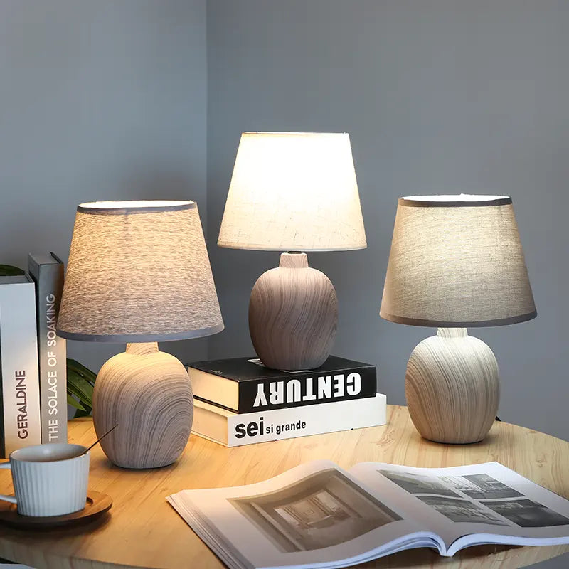 "Stijlvolle Rivo tafellamp met oplaadbare batterij, modern design, warme gloed, ideaal voor sfeervolle huisdecoratie."
