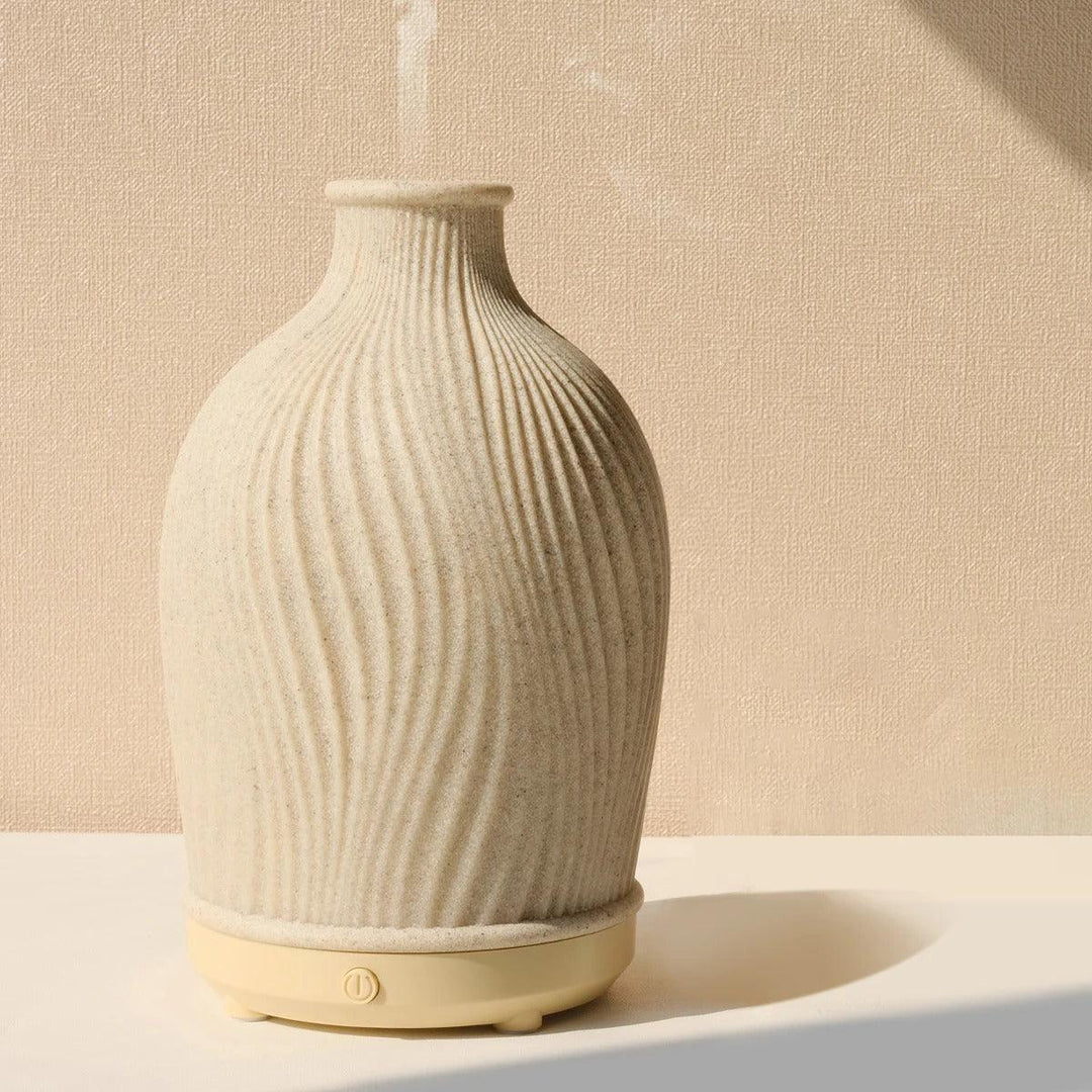 "Stijlvolle ultrasone aroma diffuser in vaasvorm, bohemian stijl, creëert rust en esthetiek in moderne interieurs."