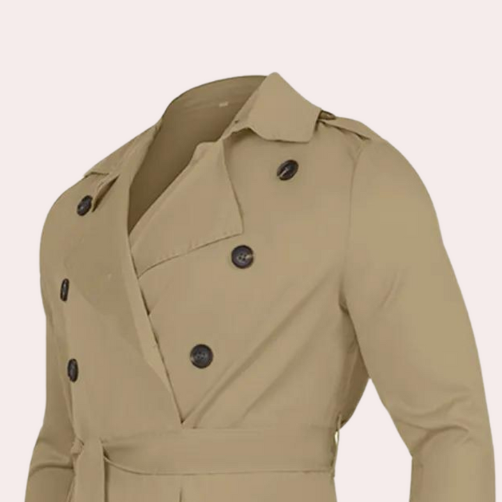 "Stijlvolle waterafstotende lange heren trenchcoat in khaki met verstelbare mouwen en tijdloos ontwerp."
