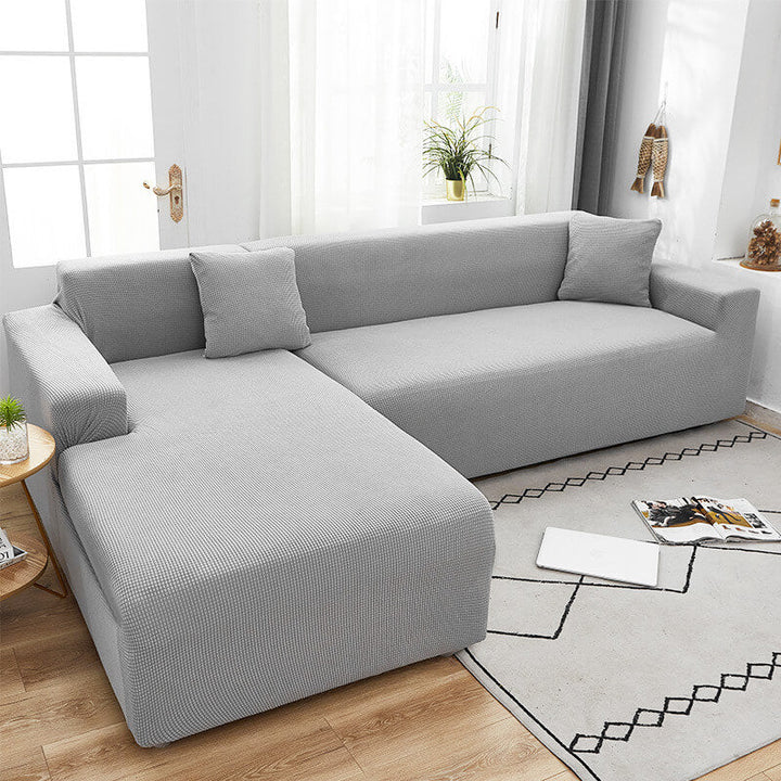 "StretchGuard rekbare bankhoes, elastisch, stijlvolle bescherming, antislip, perfecte pasvorm, modern interieurdesign"